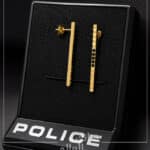 حلق POLICE الفاخر – تصميم عصري بكريستال أسود ولمسة ذهبية أنيقة